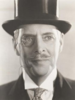 portrait-of-man-wearing-monocle-and-top-hat_u-l-q1bwh5z0.jpg