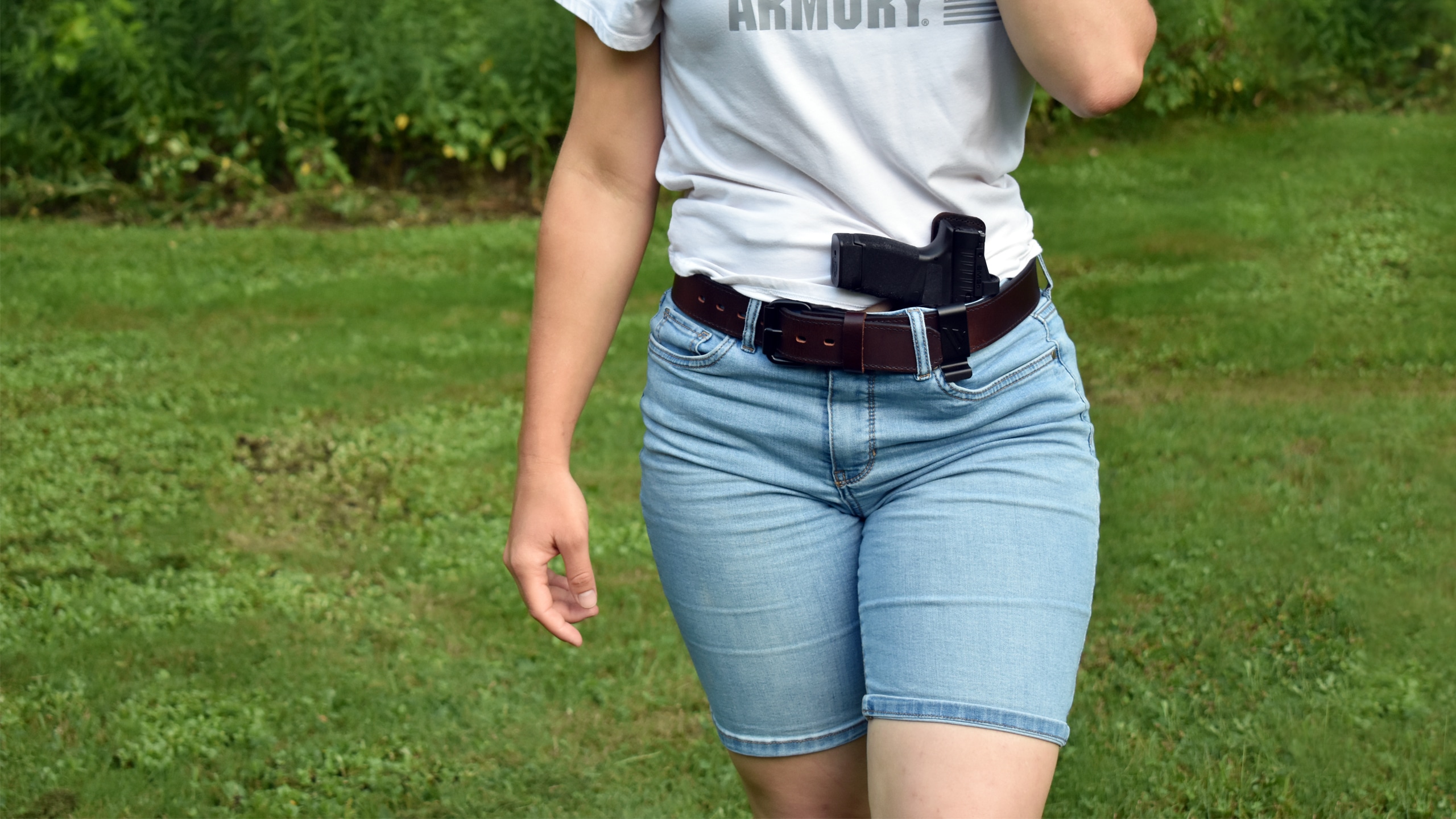 https://www.thearmorylife.com/wp-content/uploads/2023/03/womans-guide-to-avoiding-gun-belt-mistake.jpg
