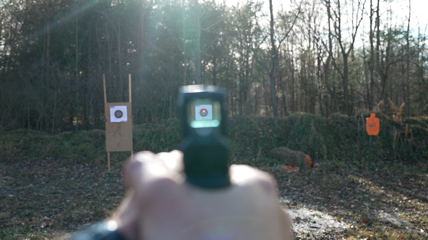 Shown in this photograph is the brightness and size of the red dot when looking through the lens of the MPS. The dot is bright and clearly visible even with glare from the sun. The MSRP of the optic is slightly over $600 which makes puts it firmly into competition with duty type sights. 