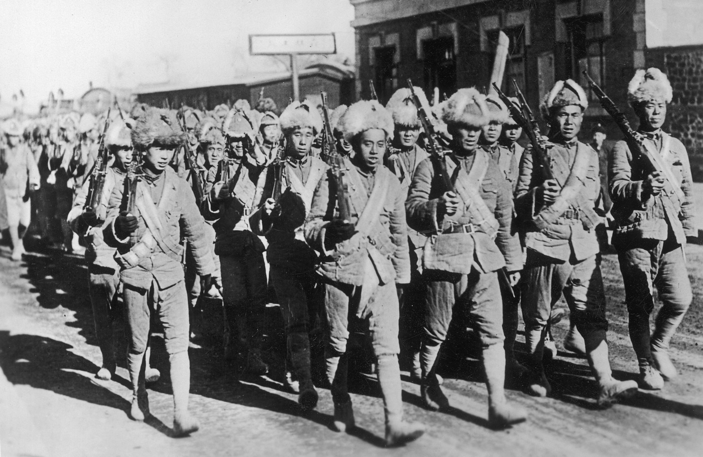 Chinese troops with Mosin-Nagant rifles march to meet Japanese invaders at Jinzhou