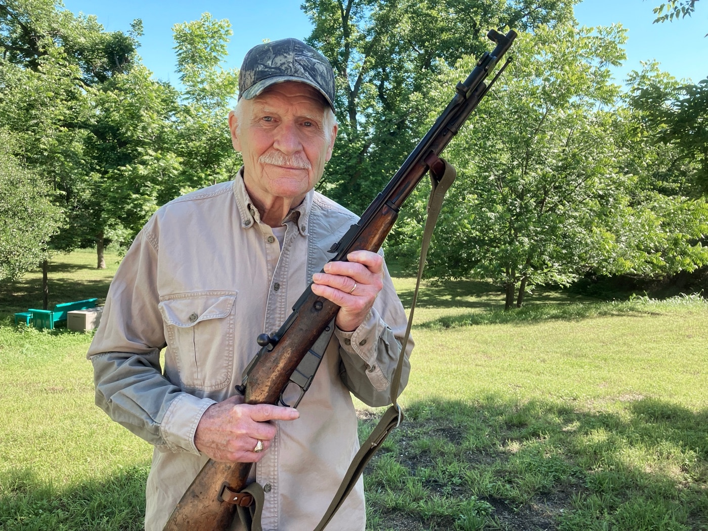 Dale Dye with Type 53 rifle from Vietnam War