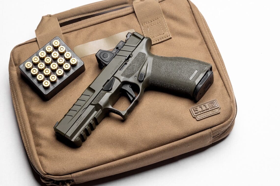In this image, we see the Springfield Armory Echelon in the OD Green finish. The 9mm pistol is laying on top of a 5.11 pistol case. Also present is 9x19mm Parabellum ammunition.
