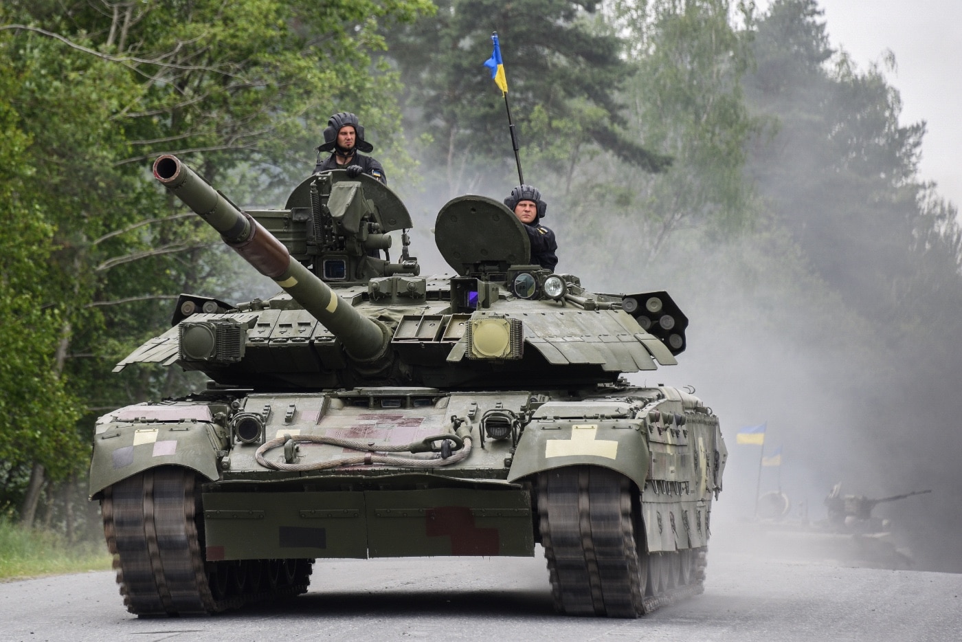 In this digital photograph, a Ukraine T-84 tank drives down road in Germany during a 2018 military competition.