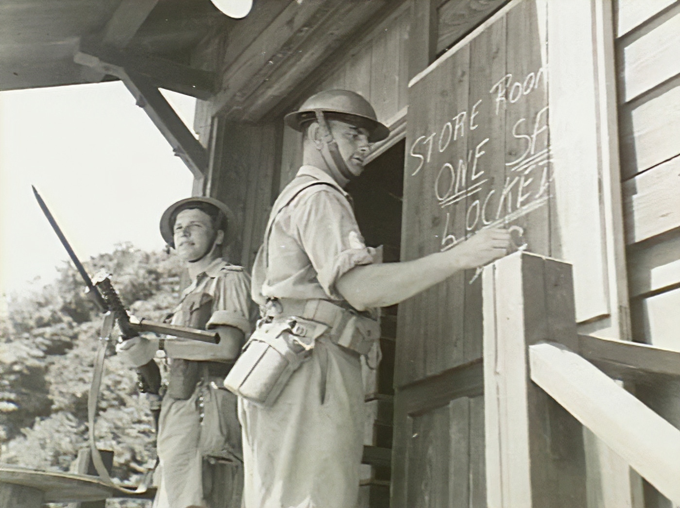 Australian troops search Japanese military base at the end of World War II
