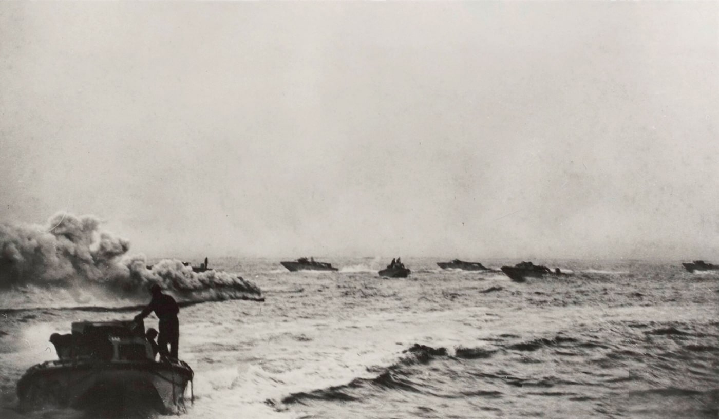 In this photo, we see Canadian forces making an amphibious assault during the Dieppe Raid. Canadian troops landing were supposed to be supported by Churchill tanks.