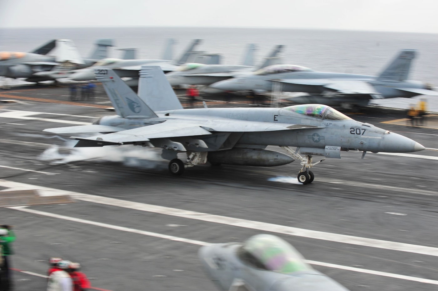 FA-18 launches from catapult of aircraft carrier