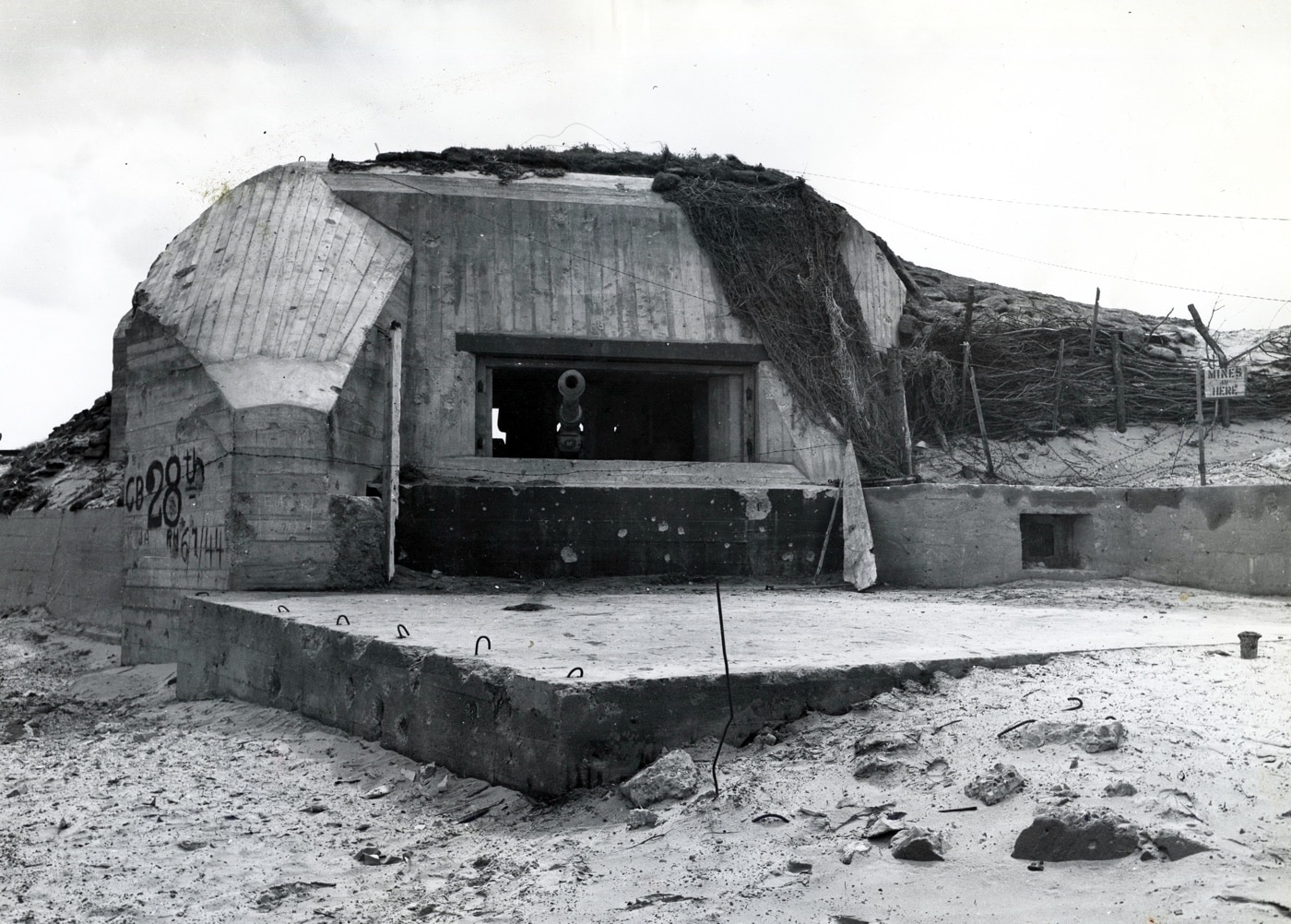In this photo, a German 88mm Pak 43/41 gun bunker is seen on Utah beach. The Pak 43/41 guns were quite powerful.