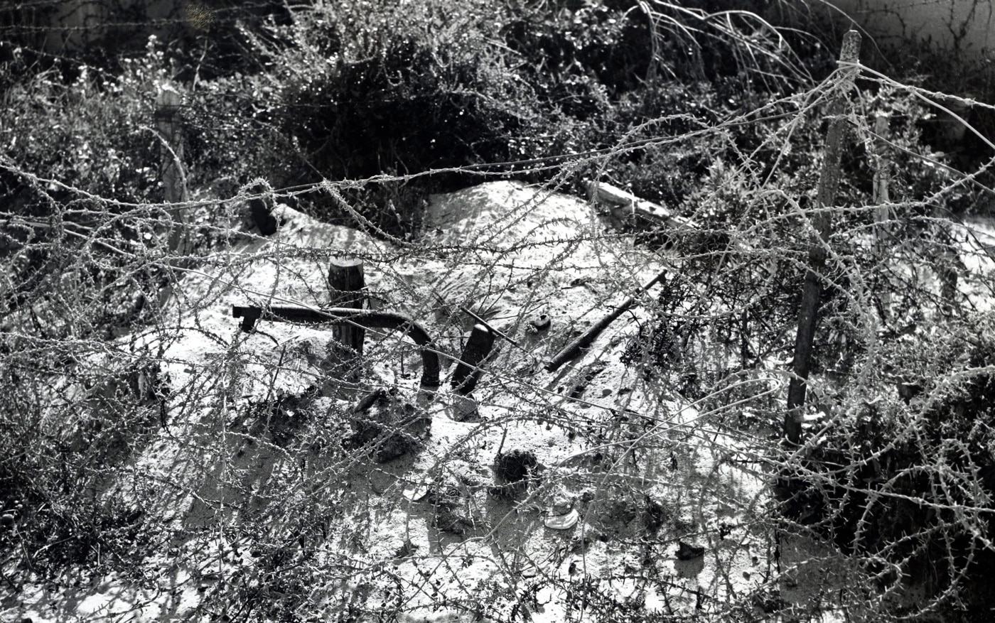 Here we see barbed wire protecting a German flamethrower trap near a bunker at Fort de Foucarville.