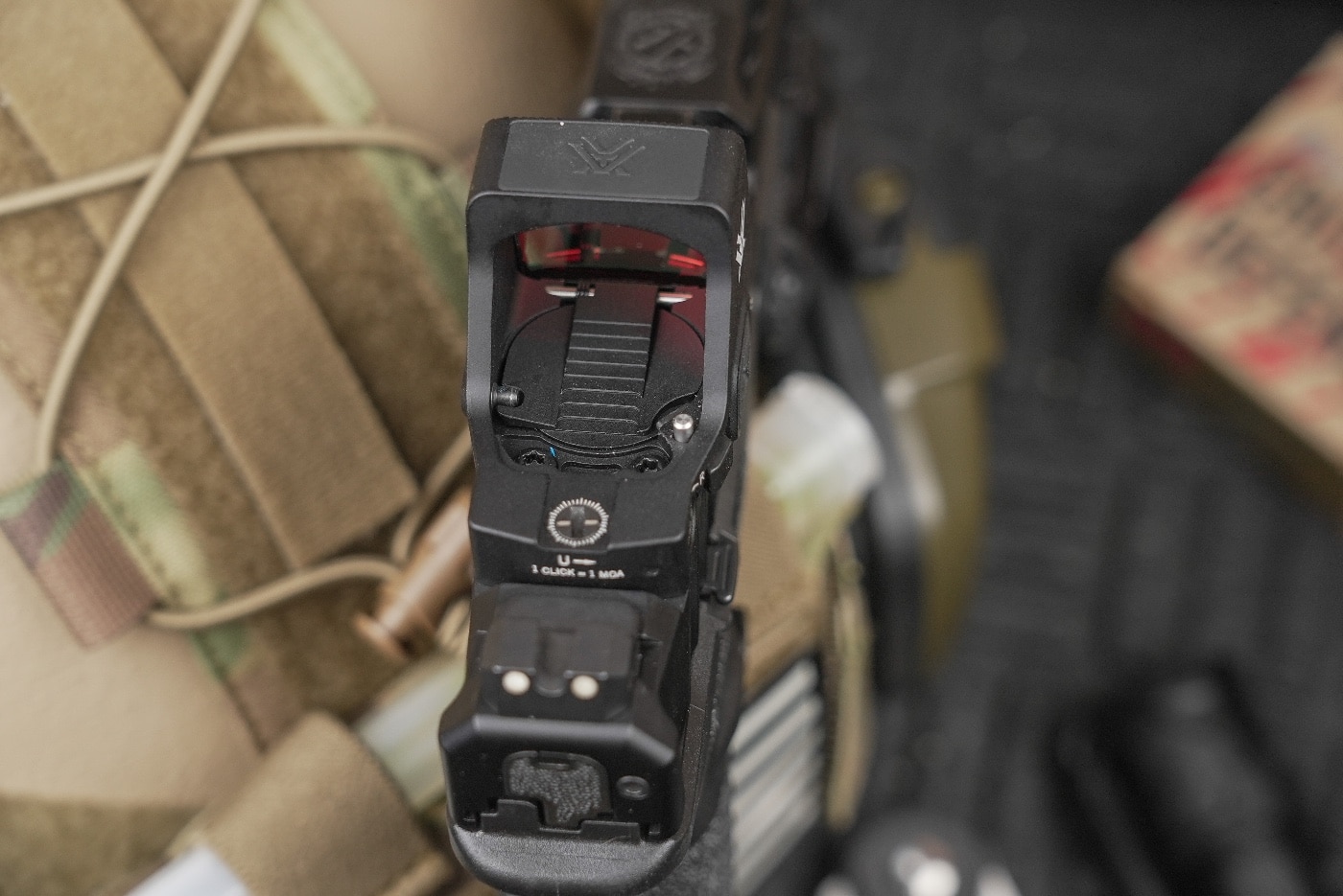 The Vortex Defender XL red dot sight is tailored for concealed carry with its robust construction and advanced features. It boasts an ultra-wide sight window for enhanced target acquisition, a 5 MOA dot, and a durable 7075 aluminum housing.