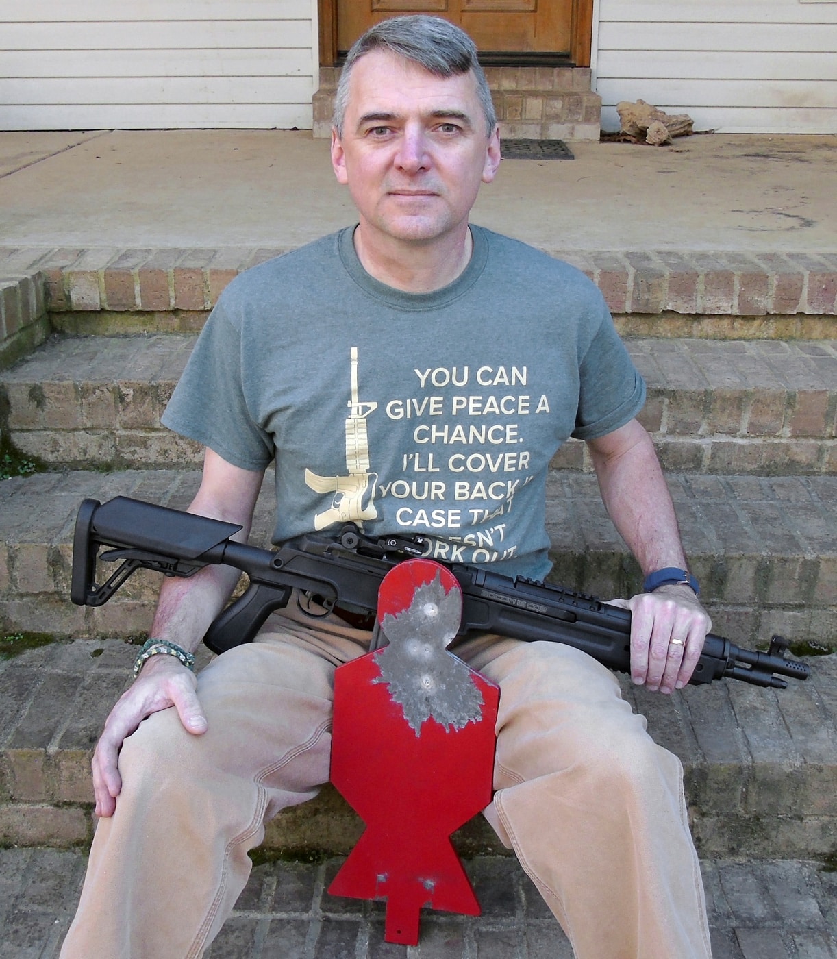 author with SOCOM 16 and target on shooting range