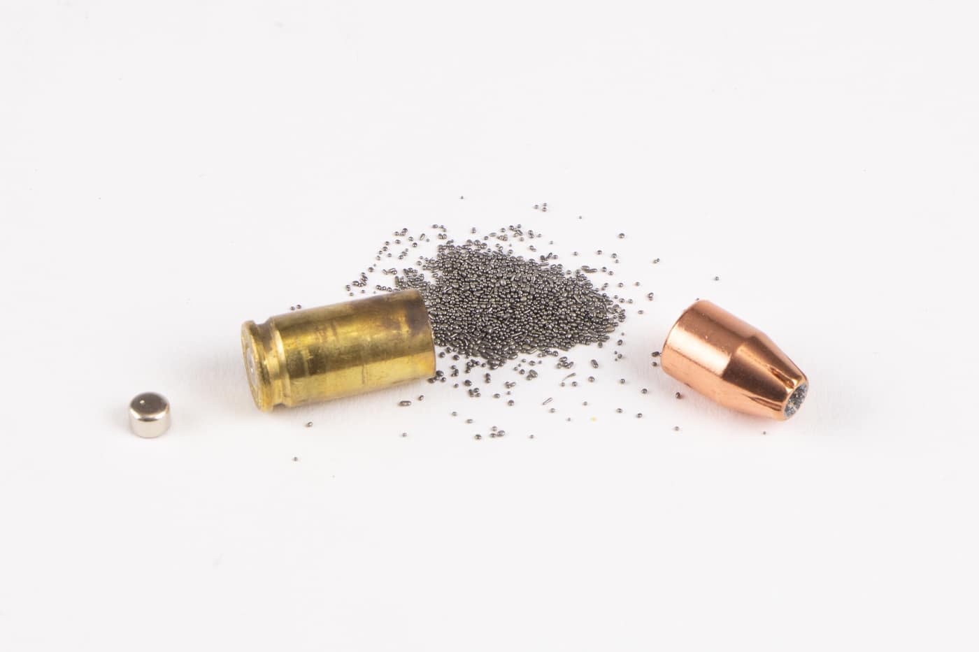 Here we see the various parts of a centerfire pistol cartridge. The bullet is a Hornady XTP hollow point bullet, ball smokeless powder, a brass case and a Boxer small pistol primer.