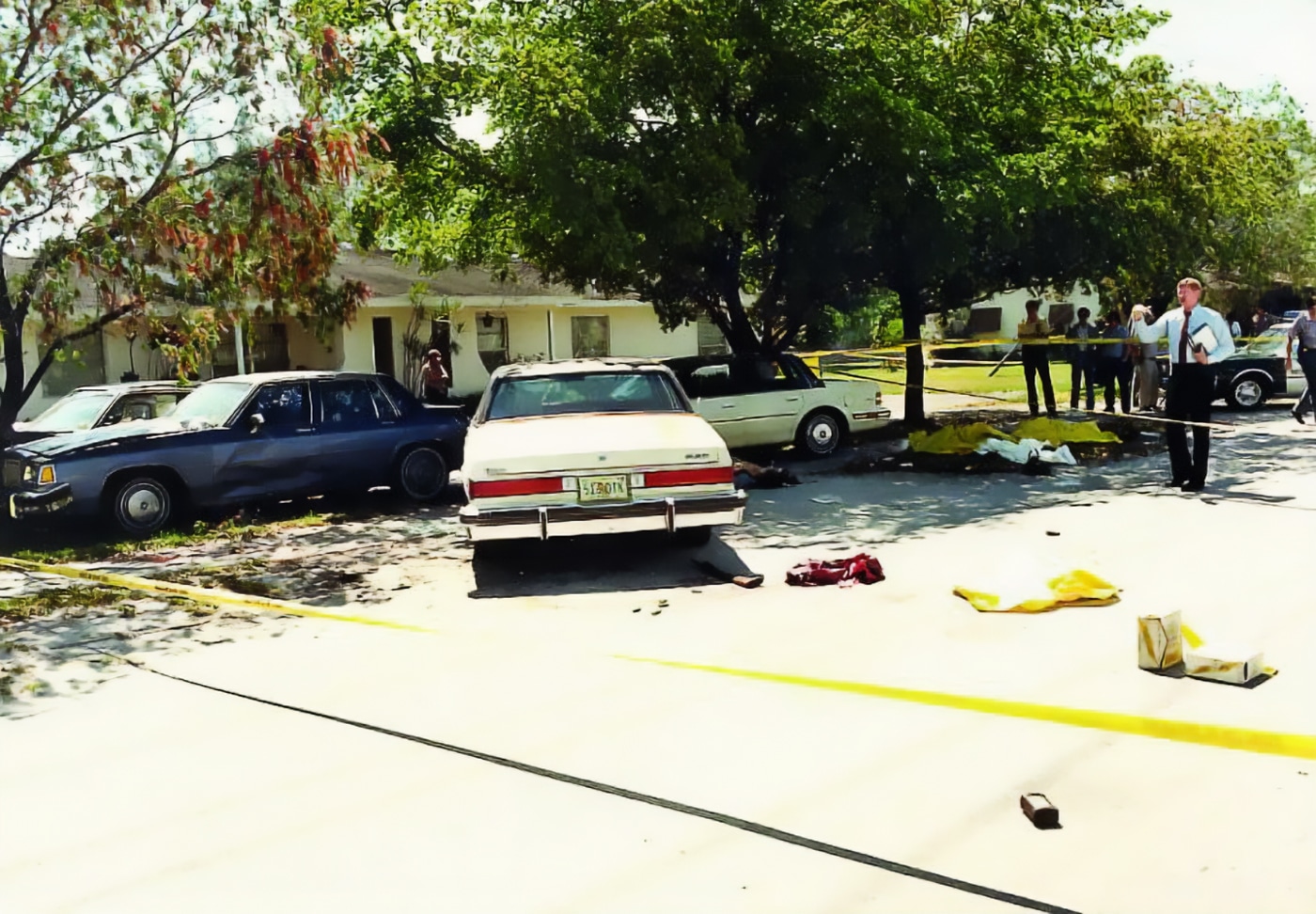 In this crime scene photograph we see the aftermath of the 1986 FBI Miami Shootout. The incident happened on April 11, 1986, in Miami-Dade County, Florida. A group of FBI agents attempted to apprehend William Russell Matix and Michael Lee Platt for a series of armed robberies.