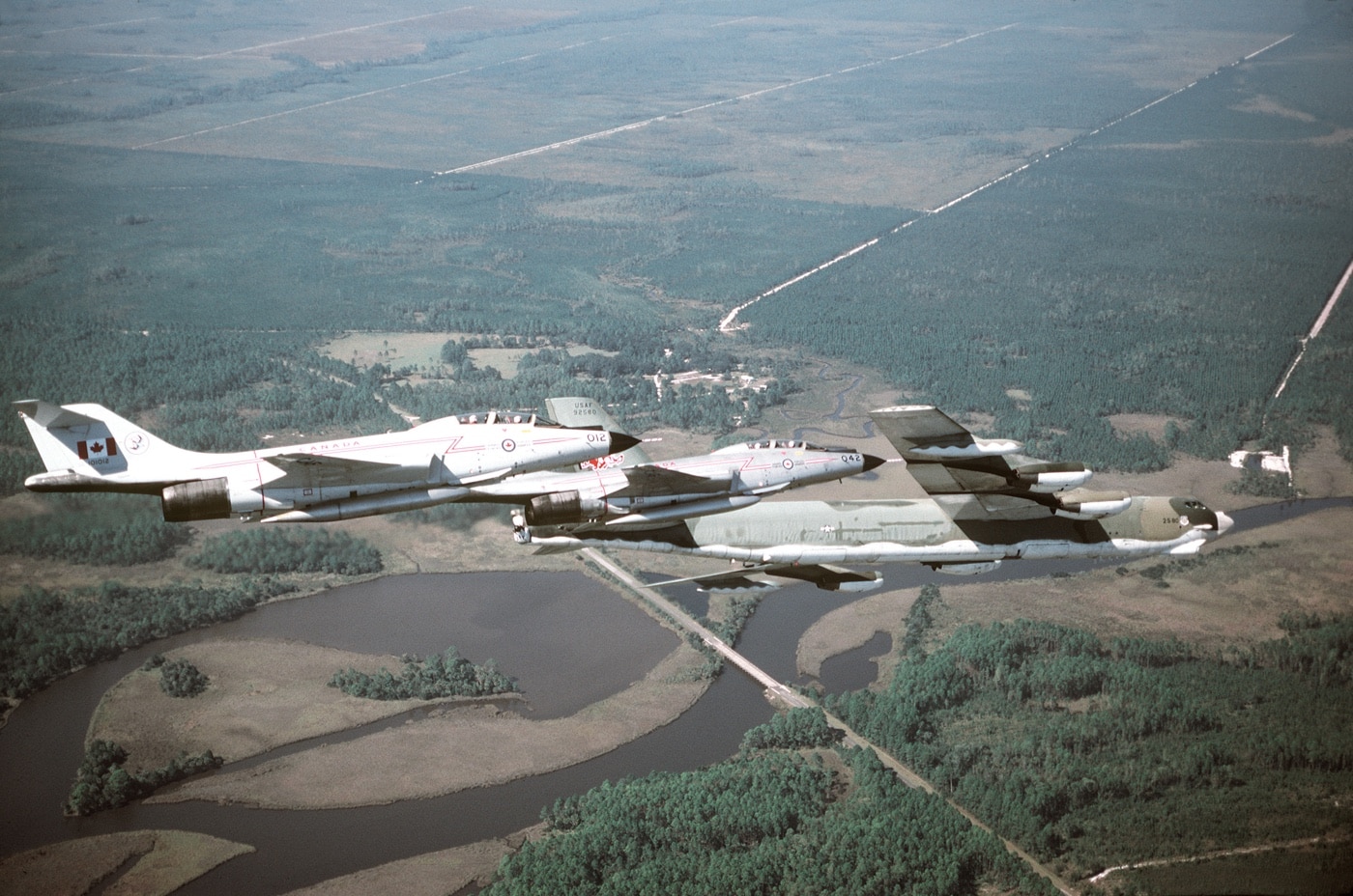 Canadian CF-101 Voodoo fighters intercept a USAF B-52 in training exercise