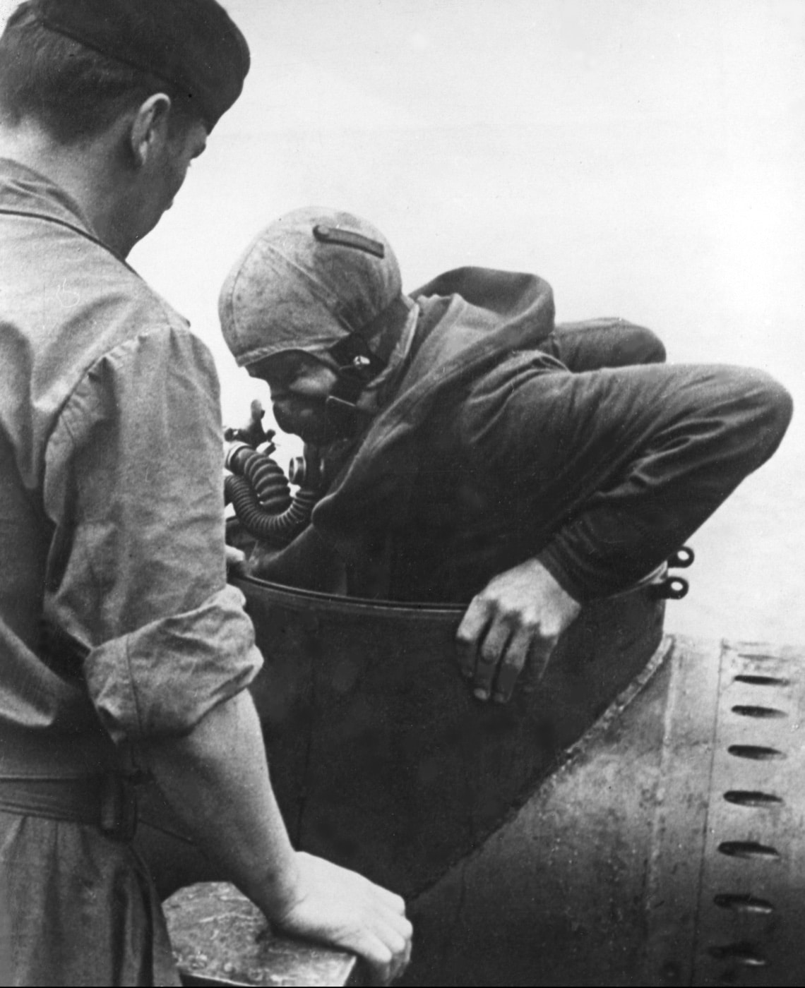 Marder pilot entering the midget submarine