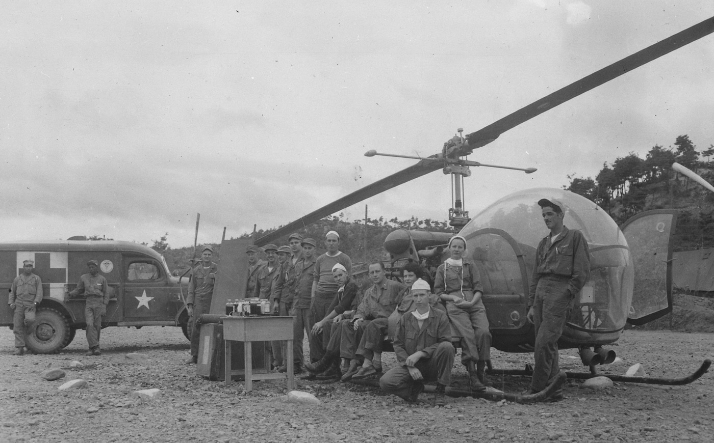 Mobile Army Surgical Hospital team waits for wounded soldiers to arrive by helicopter