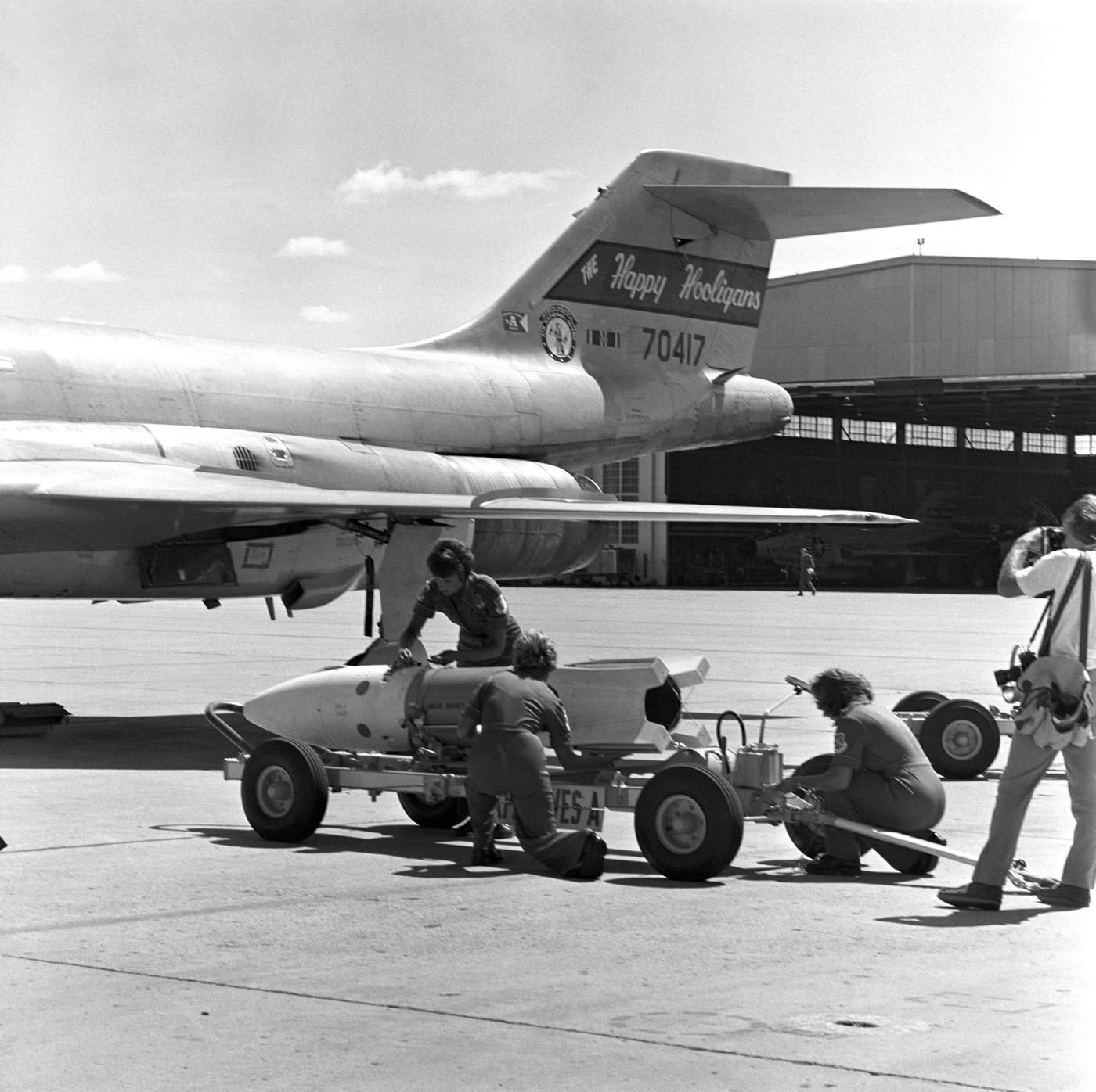 US Air Force airmen load ordnance on F-101 Voodoo