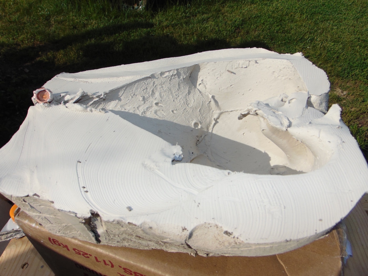 In this digital photograph, we see a wet clay block that had been shot with a .40 SW round. The cavity created is impressive and is suggestive of its ability to stop a violent criminal.