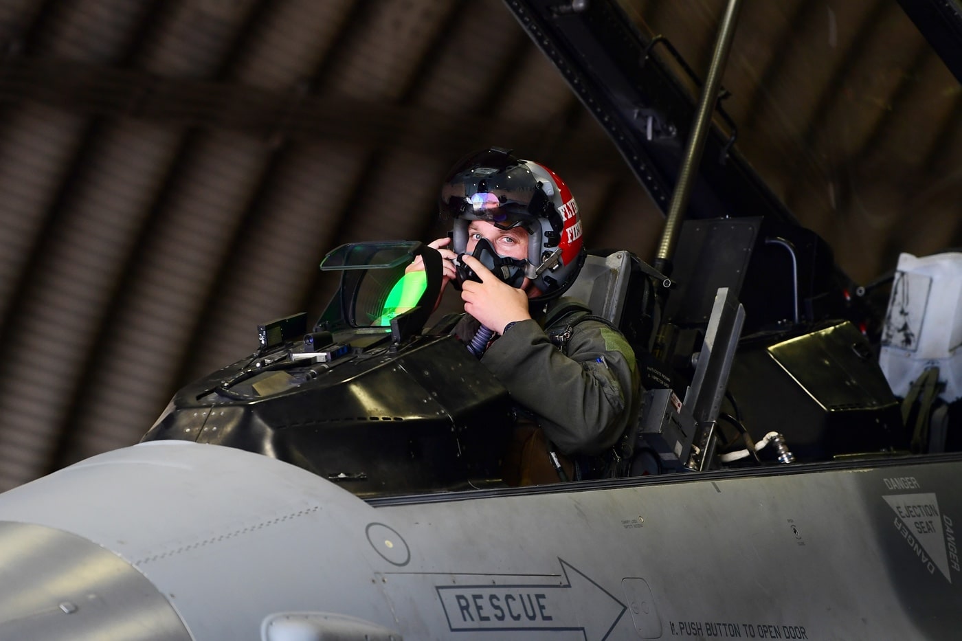 pilot prepares to fly a mission over Korea in an F-16