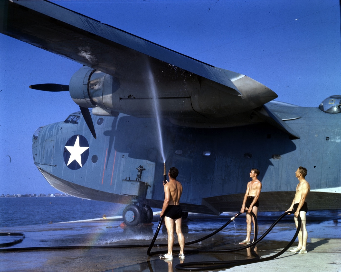 sailors wash PBM-3 after a mission