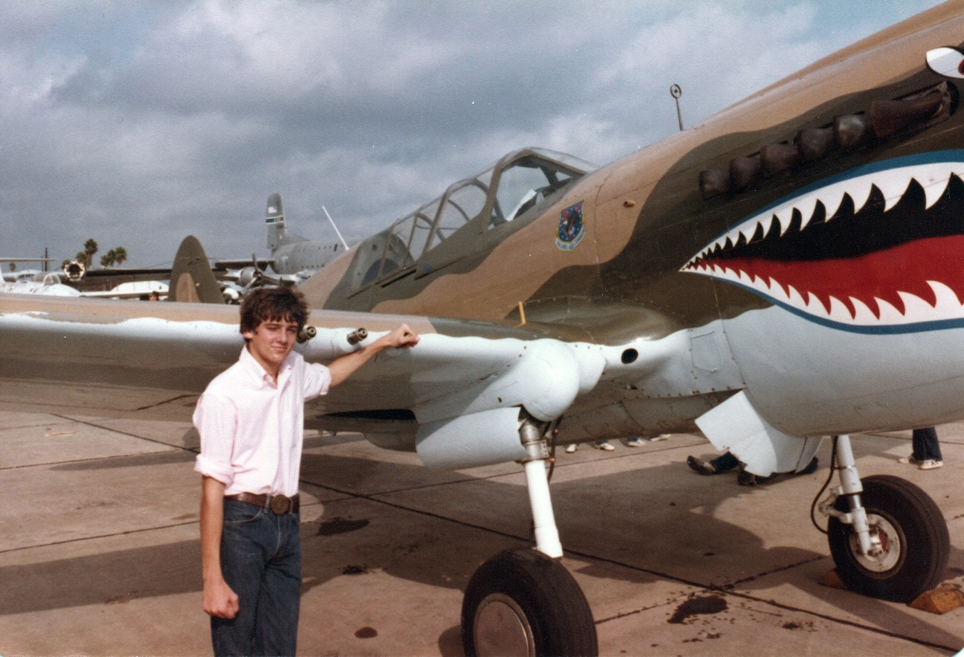 author with Curtiss P-40 Warhawk fighter