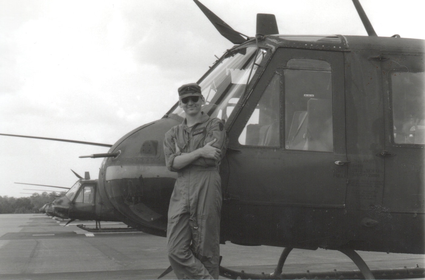 author with UH-1 Huey in flight school