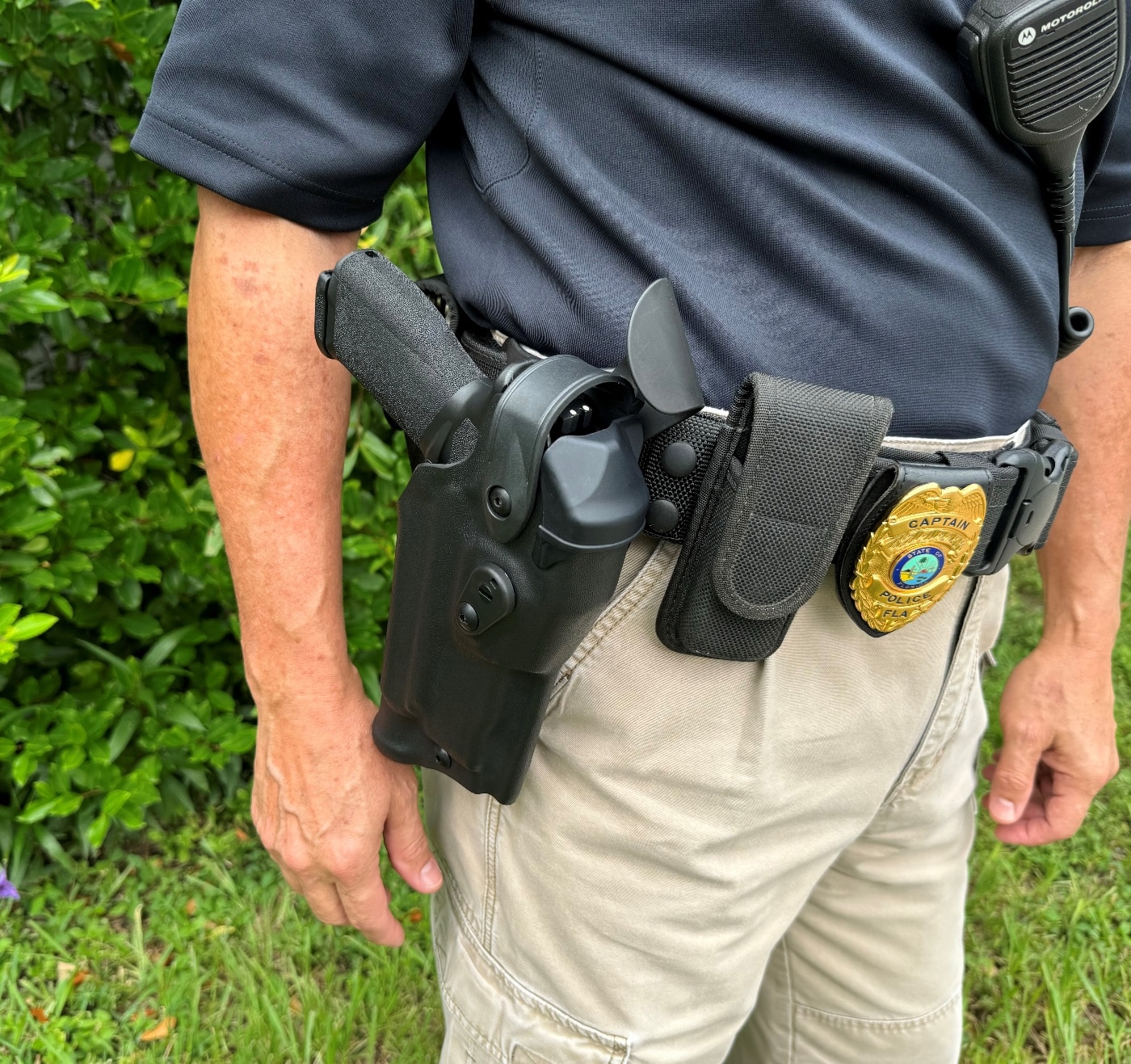 Law enforcement officers, police officers and deputy sheriff carry semi-automatic pistols to execute their duties. A retention holster is an important piece of equipment.