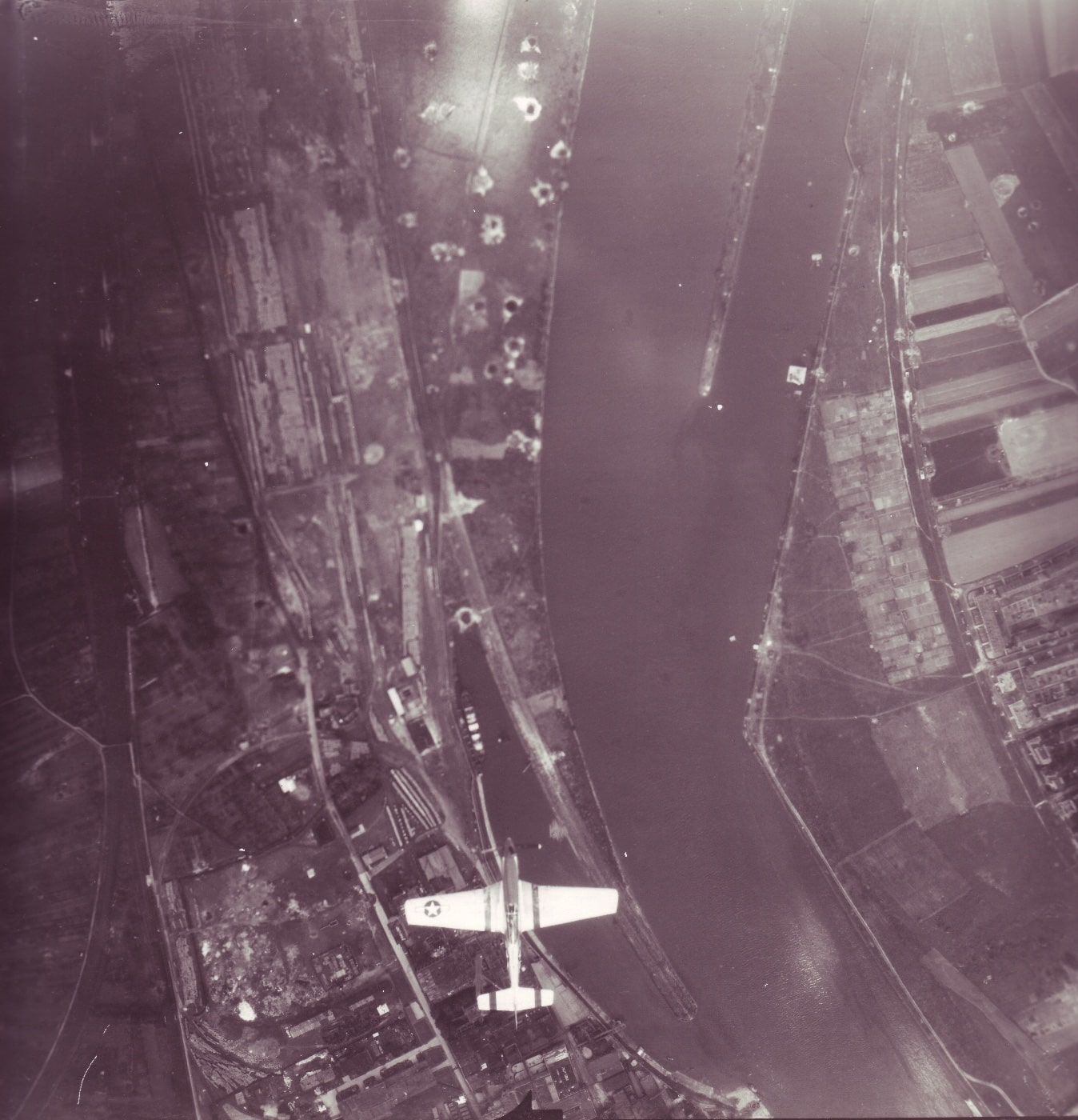 Elmer Pankratz photographs another F-6D over the Rhine River in World War II