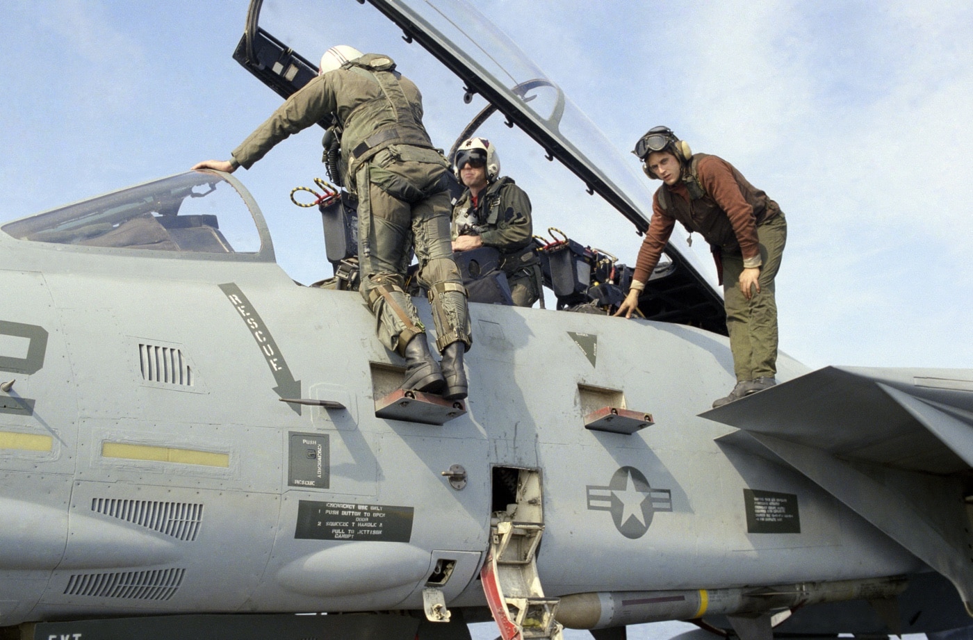 F-14 pilot prepares for combat air patrol on USS Saratoga CV-60 Forrestal-class aircraft carrier