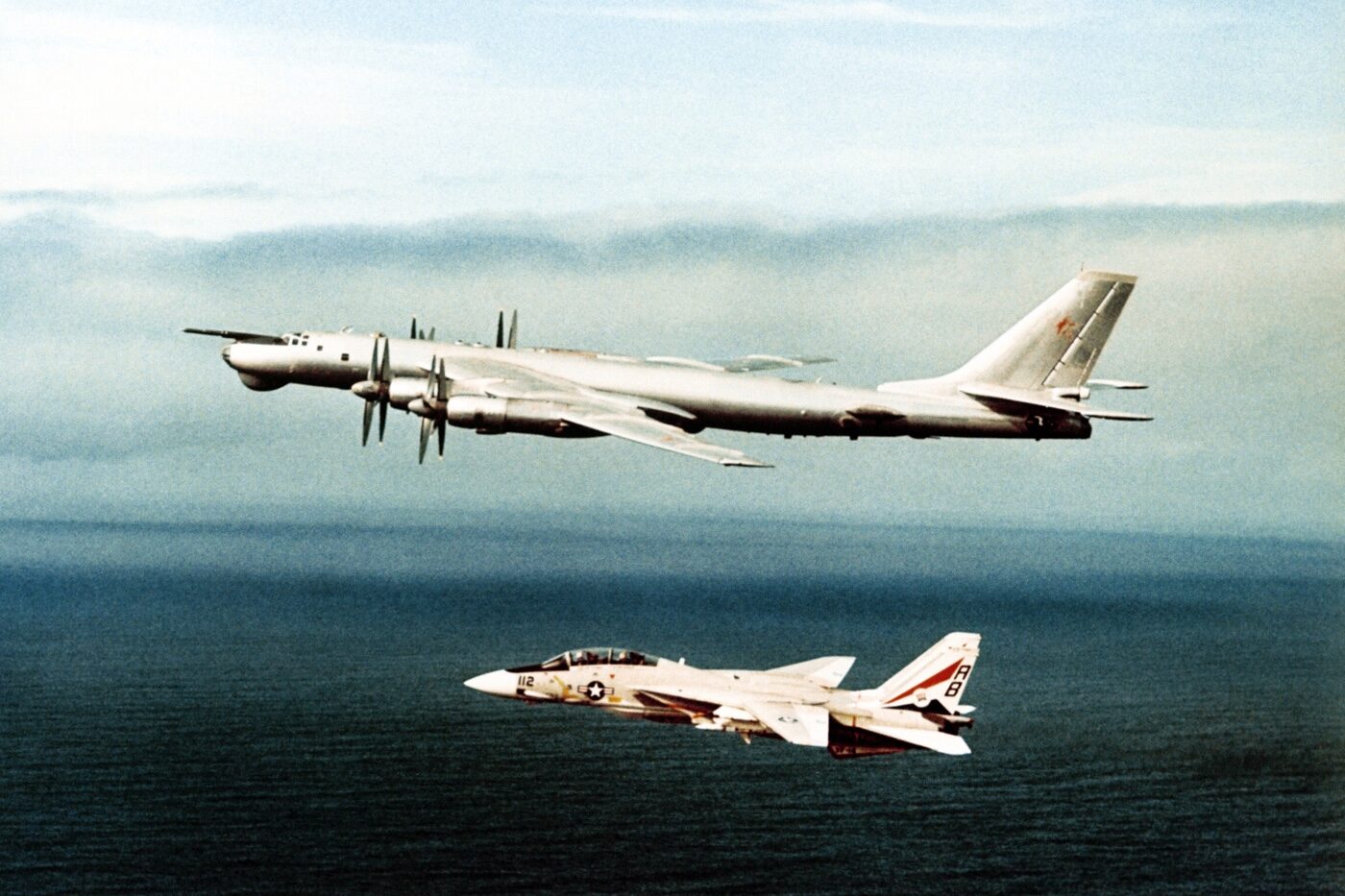 F-14A escorts a Soviet Tu-95 Bear bomber away from a carrier group