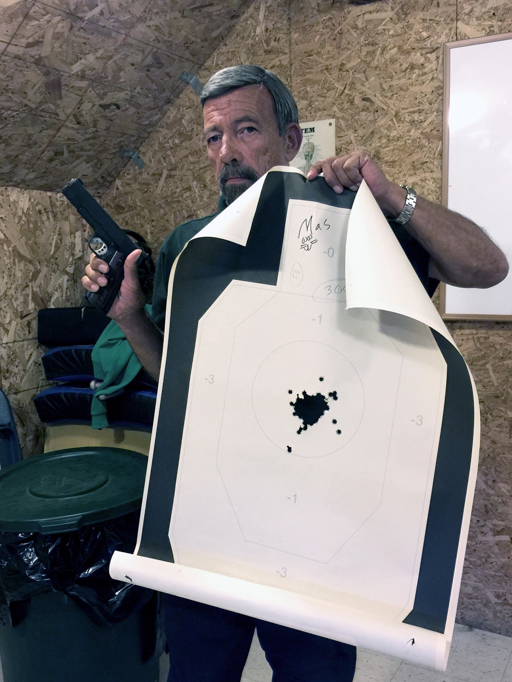 Massad Ayoob with shooting target M1911