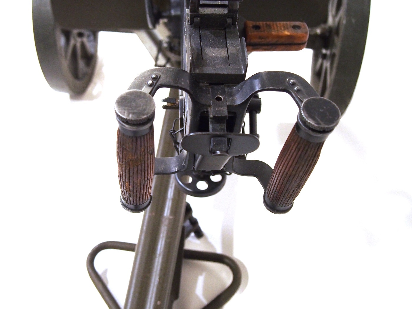 SG-43 machine gun with spade grip and thumb trigger on tripod