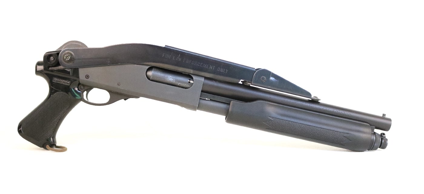 Shown in this photo is the author's short barrel Remington Model 870 shotgun that he carried for bear defense as a United States Army helicopter pilot in Alaska. Also known as a sawed-off shotgun, the author completed the correct BATFE paperwork prior to completing the modifications to the firearm.