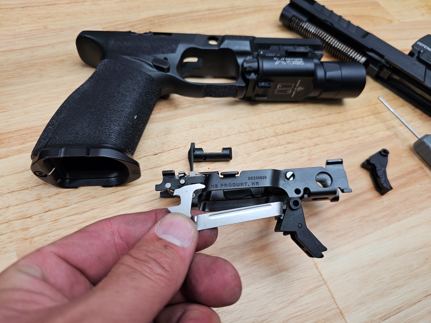 removal of Springfield Echelon Central Operating Group to install aftermarket trigger