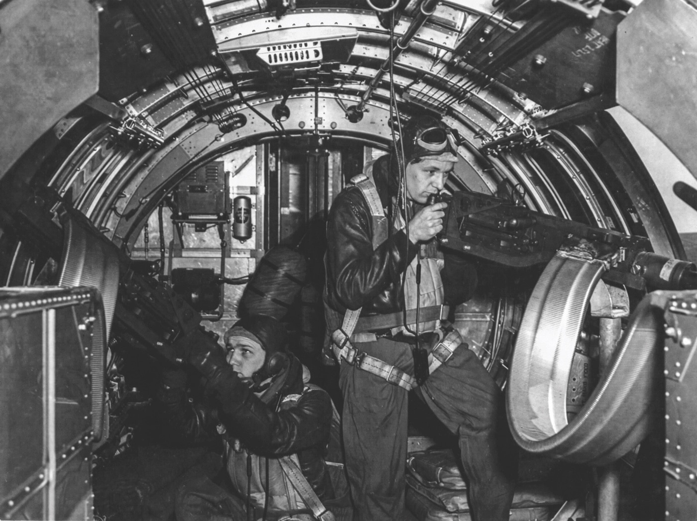 waist gunners Boeing B-17 Flying Fortress crew engage German fighter planes in World War II