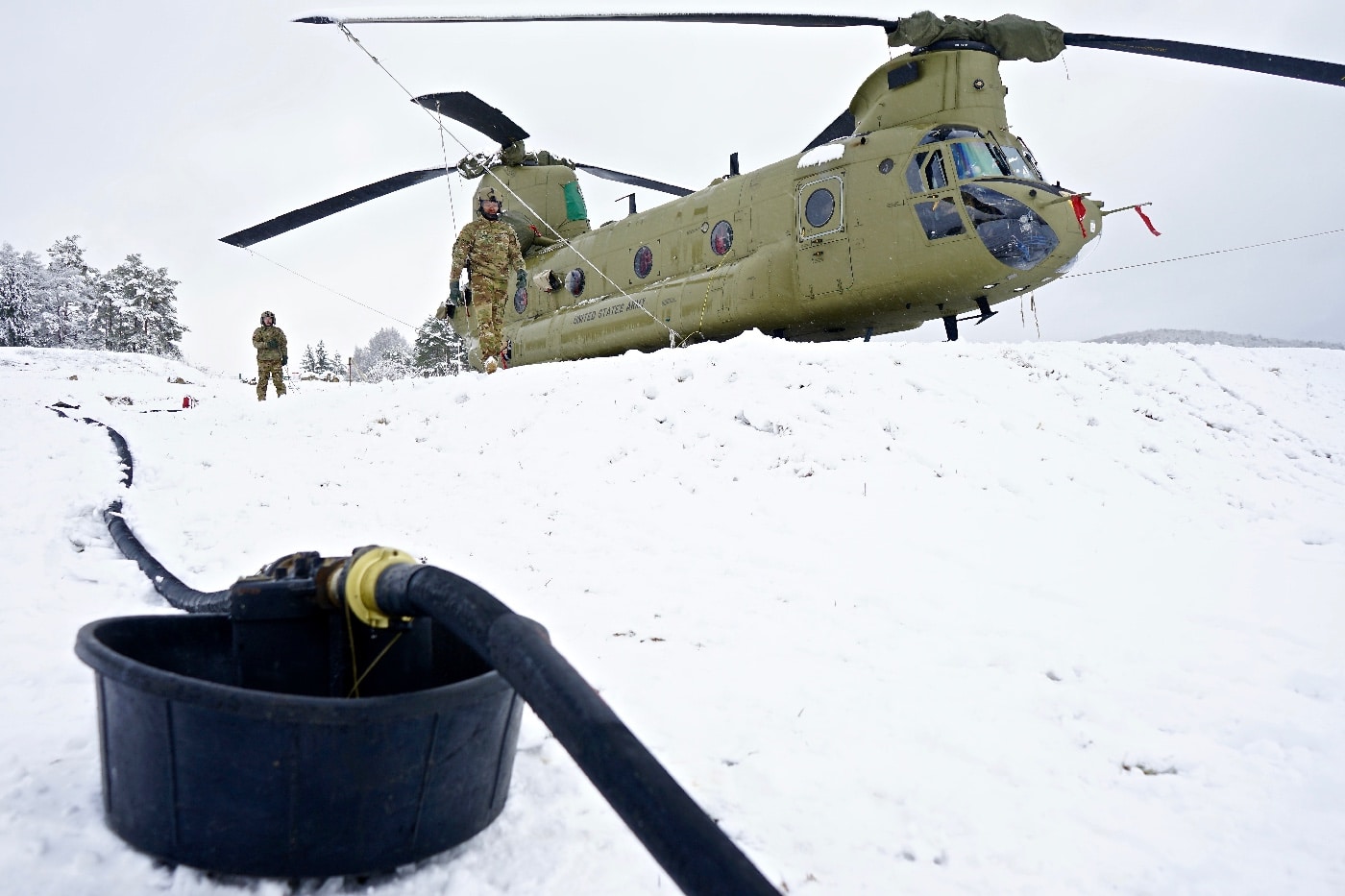 CH-47 Chinook refuels in the field