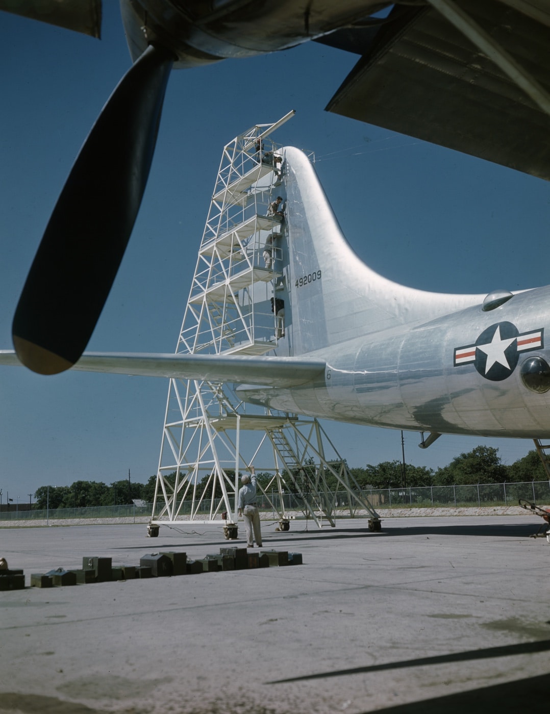 Consolidated ground crew hook up control cabled on the rudder of a B-36