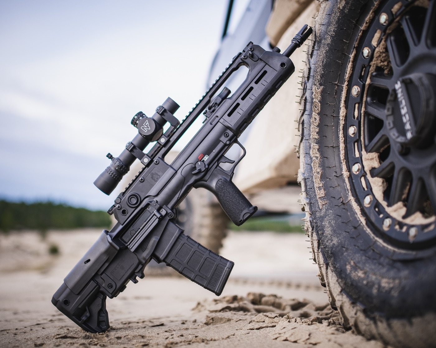 Springfield Armory Hellion bullpup rifle 556x45 NATO next to truck tire