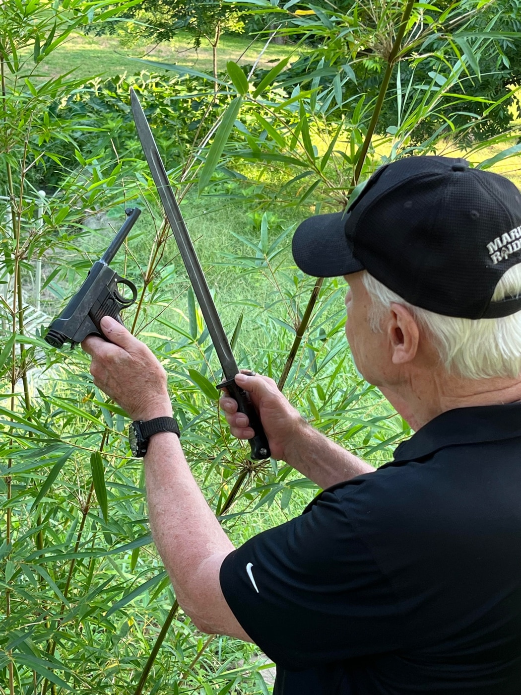 author Dale Dye with Japanese pistol and bayonet