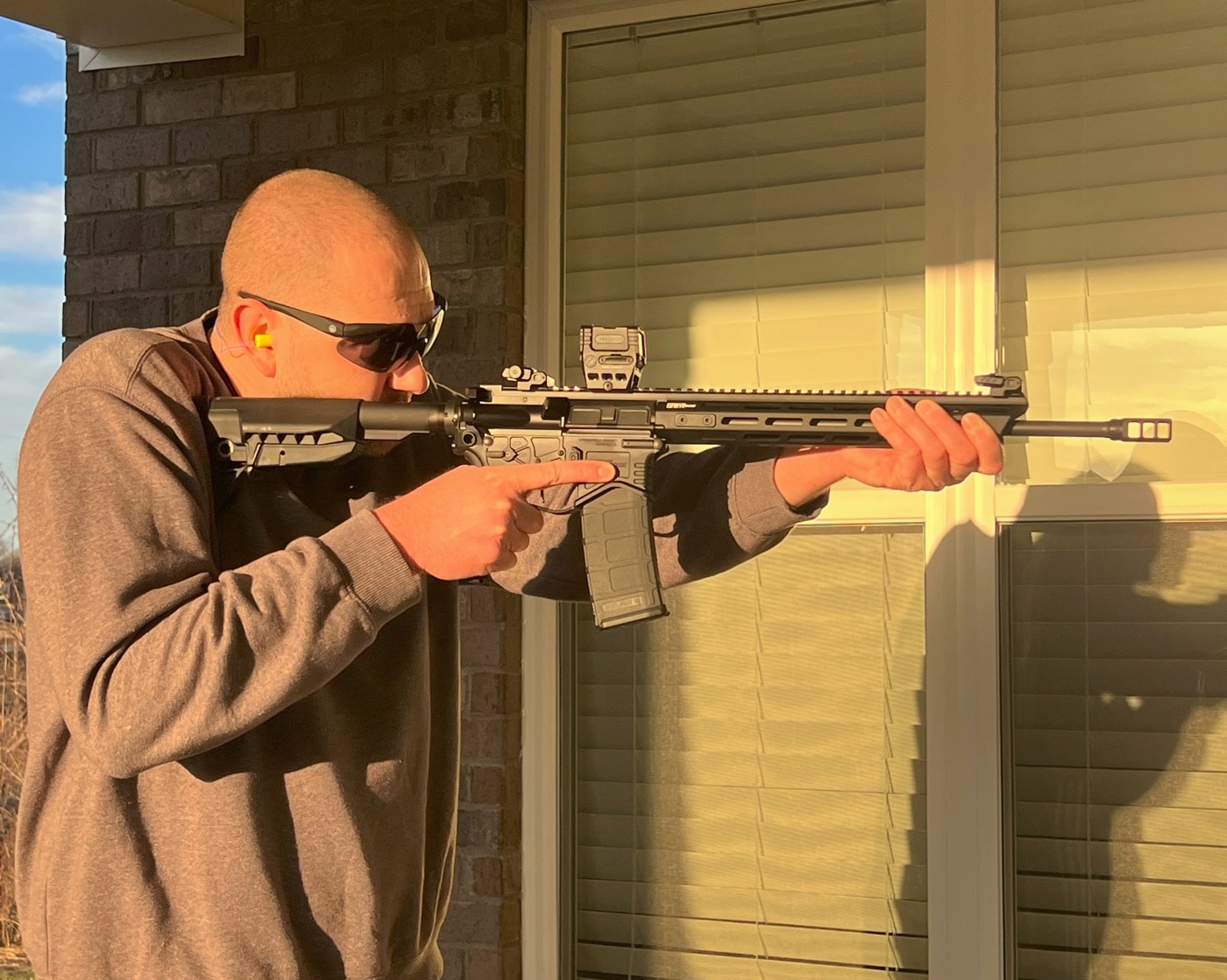 author shooting Springfield Armory SAINT Edge rifle chambered for 5.56x45mm NATO cartridge