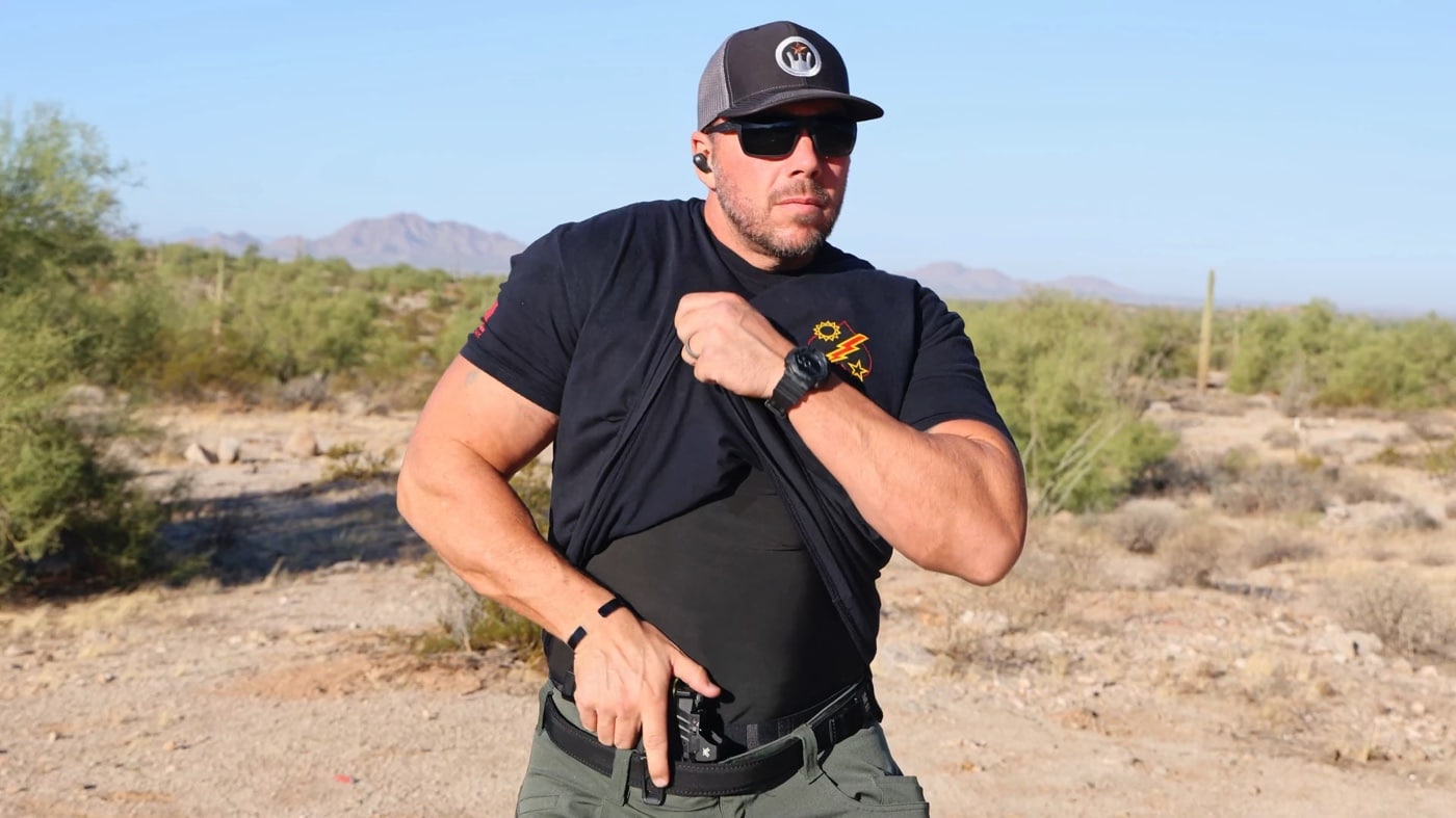 author testing Crucial Concealment Universal Light holster