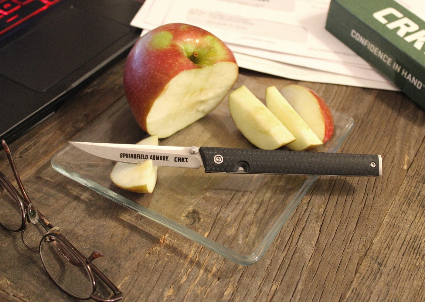 cutting fruit with CRKT CEO knife