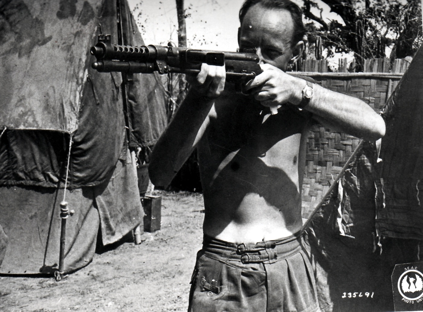 soldier tests captured Type 100 submachine gun in Burma during March 1945