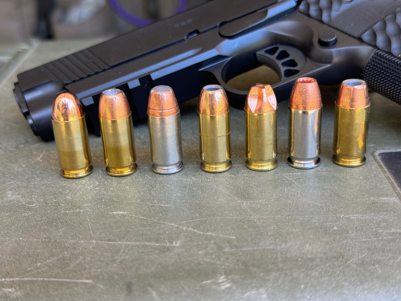 testing Springfield Armory 1911 TRP on shooting range with variety of 45 ACP ammunition