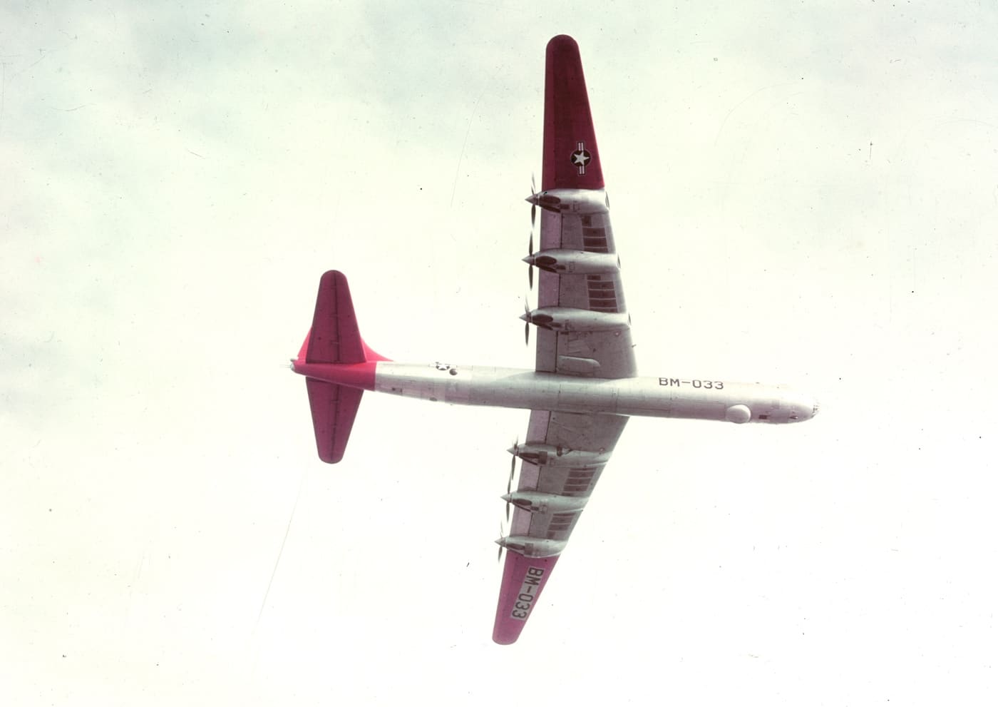 underside view of B-36 strategic bomber in flight