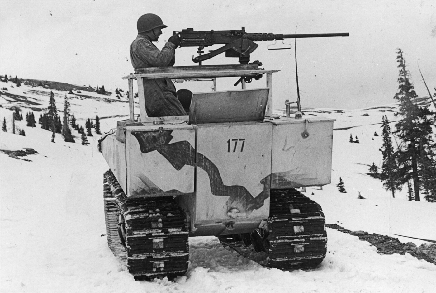 10th Mountain Division soldier with M2 Browning on a tracked vehicle