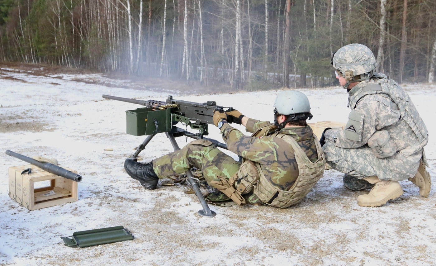 Czech Republic soldier fires American M2 Browning machine gun during NATO training