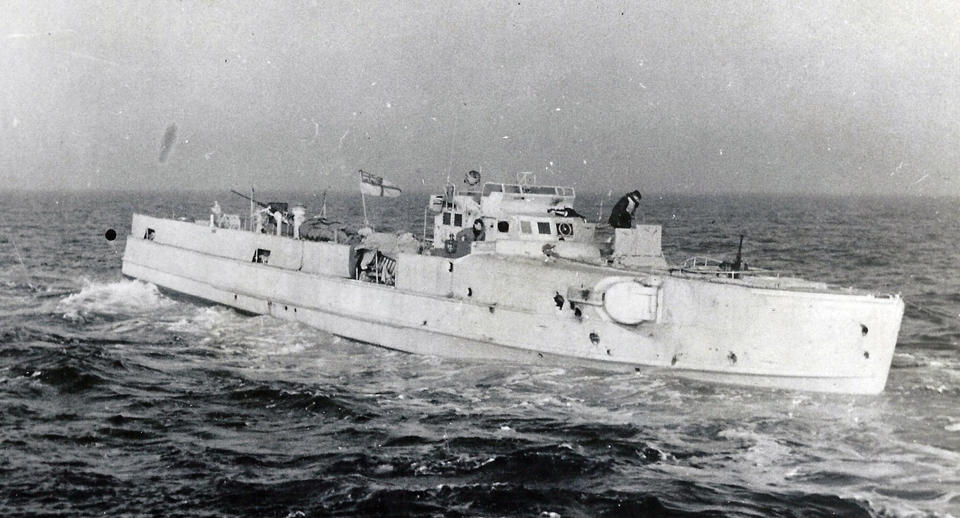 E-boat captured by the Royal Navy Plymouth Port bustled with activity as Exercise Tiger assembled a fleet of ships and vehicles. Soldiers loaded trucks and tanks onto landing craft, unaware of the impending tragedy. This staging area became a crucial hub for the Normandy invasion, despite the grim toll of the rehearsal.