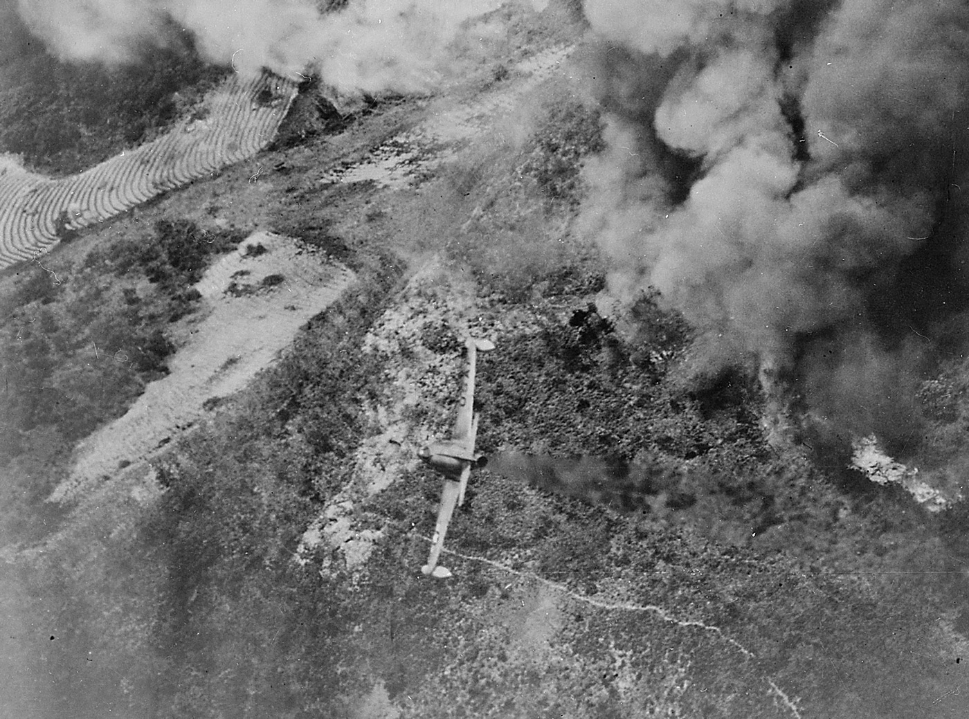 F-80 Shooting Star lines up for a gun attack on a North Korean artillery position