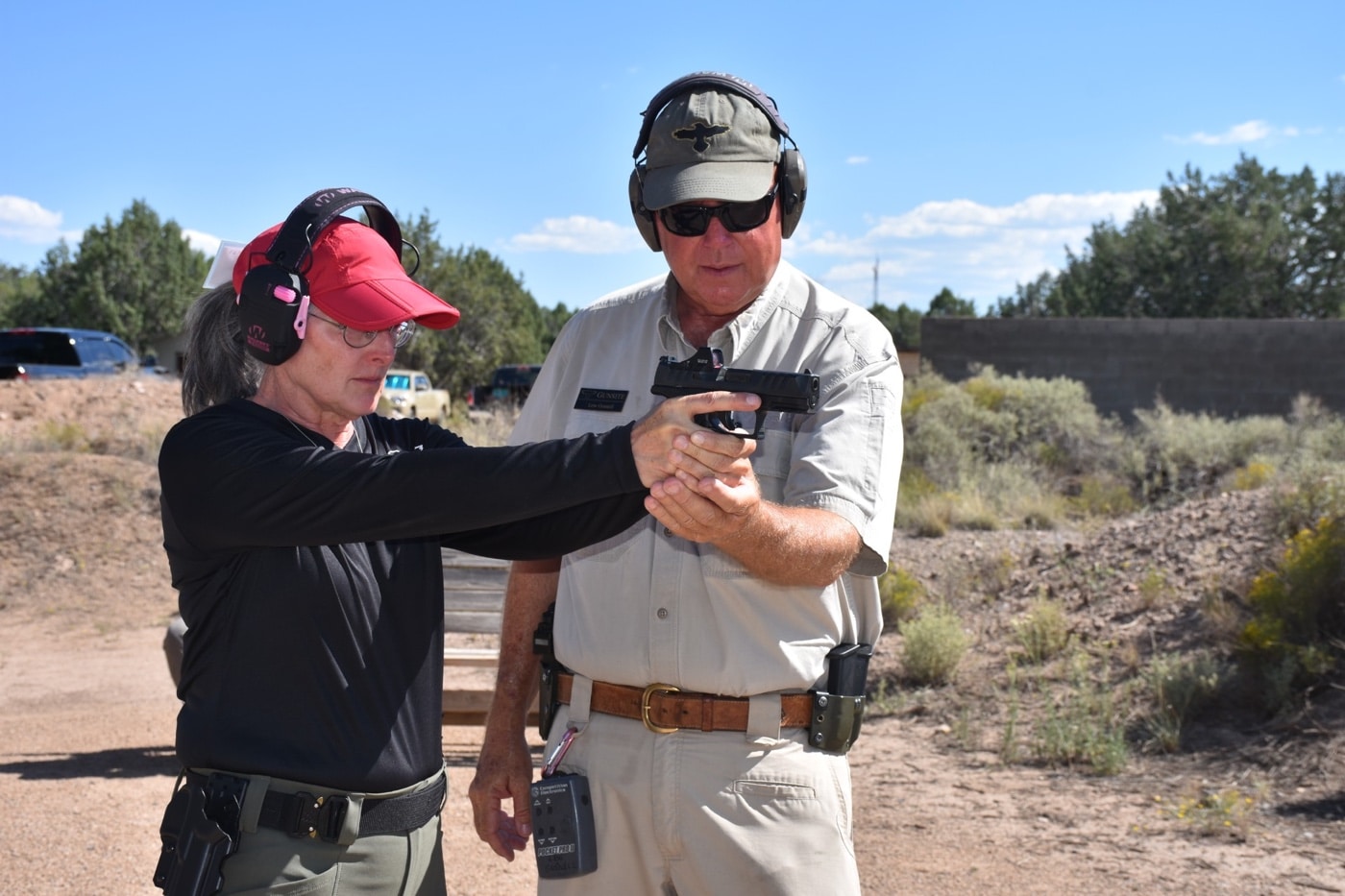 Gunsite Performance Pistol Symposium Class Rob Leatham woman shooting a pistol