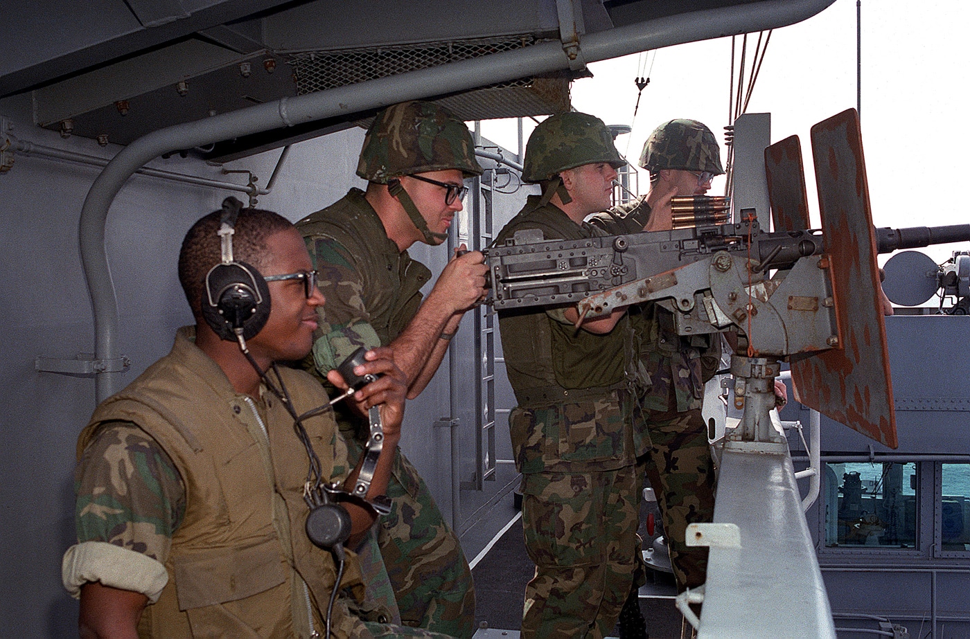 Marines fire M2 machine gun from the USS Dwight D Eisenhower CVN-69 aircraft carriers